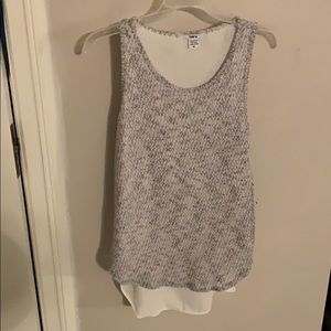 Knit and white blouse.